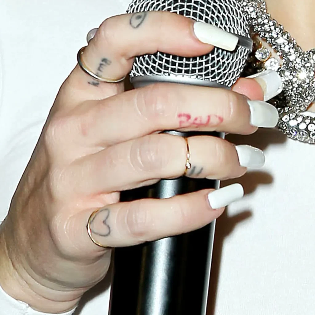 cyrus miley stick hand poke tattoo