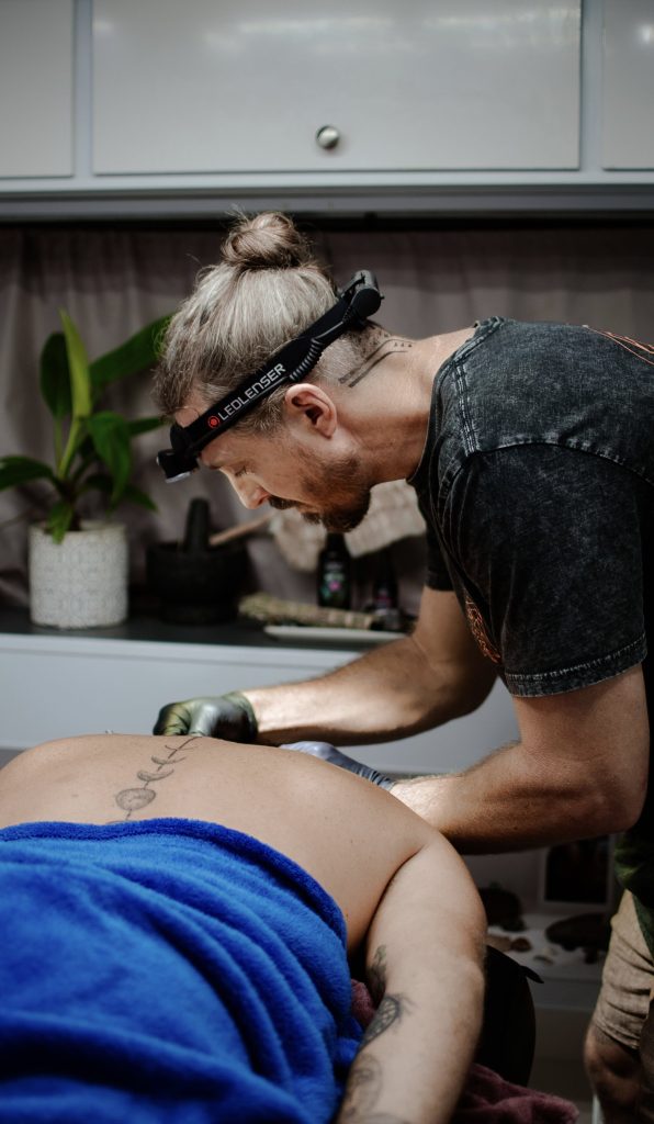 tattoo back hand poked