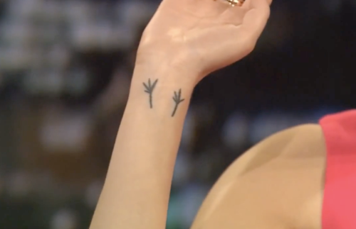 emma stone hand stick poke tattoo