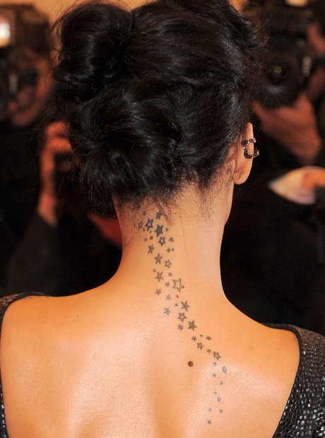 rihanna-tattoo-stick-hand-poke